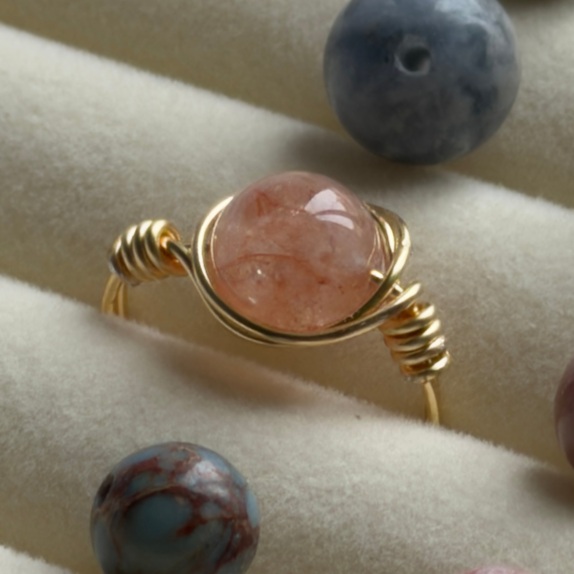 Handmade wire-wrapped ring with natural strawberry quartz. Adjustable fit and custom sizing available. A bold yet elegant statement piece.